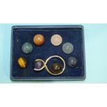 A 9ct gold ring with eight interchangeable hard stone spheres, in fitted case marked Nina Breddal,