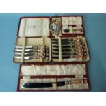 A set of six Royal Crown Derby tea knives in box, together with four similar, a butter knife and