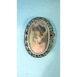 A small oval miniature painted with a Gainsborough-style portrait of a woman, in white metal and
