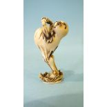 A 19th century ivory netsuke of Daruma, stretching and yawning after his nine-year meditation, the