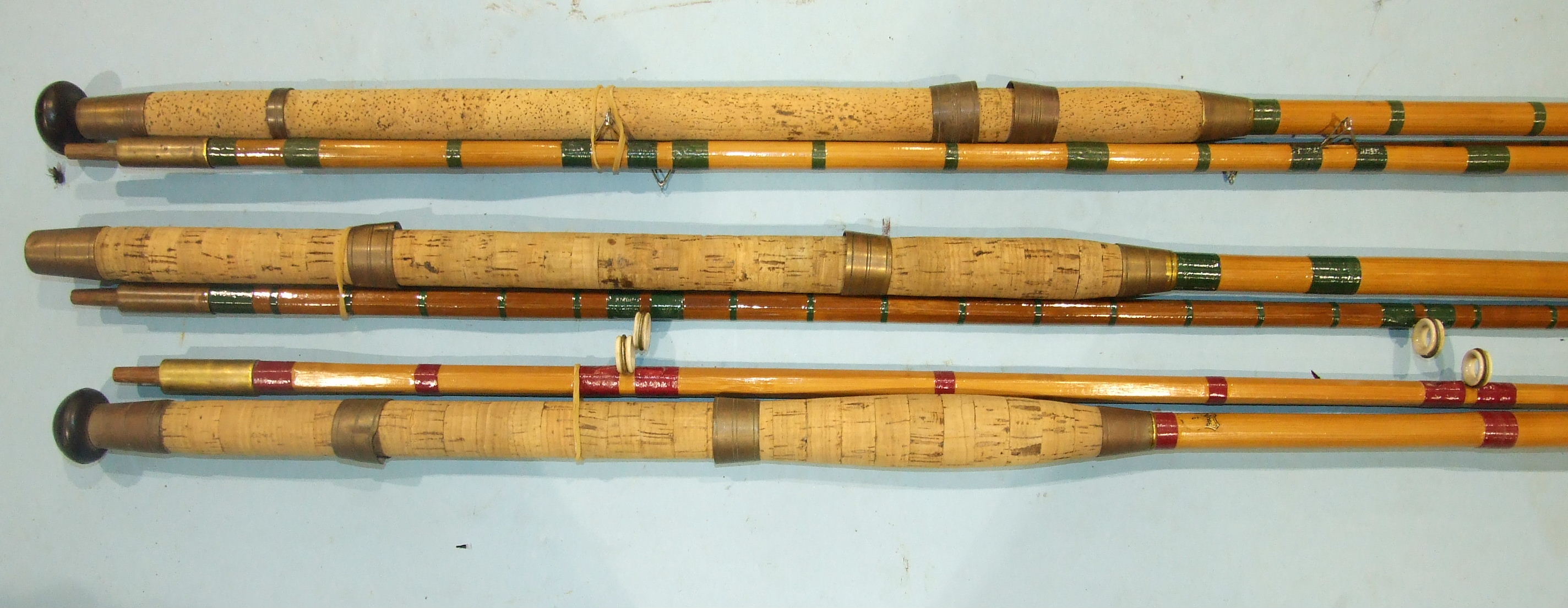 A collection of split cane rods by W Hamlin, Bulcock & Son and others.