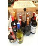 A Fortnum & Mason wood and wicker hamper box, various bottles of red wine and sparkling wine and one