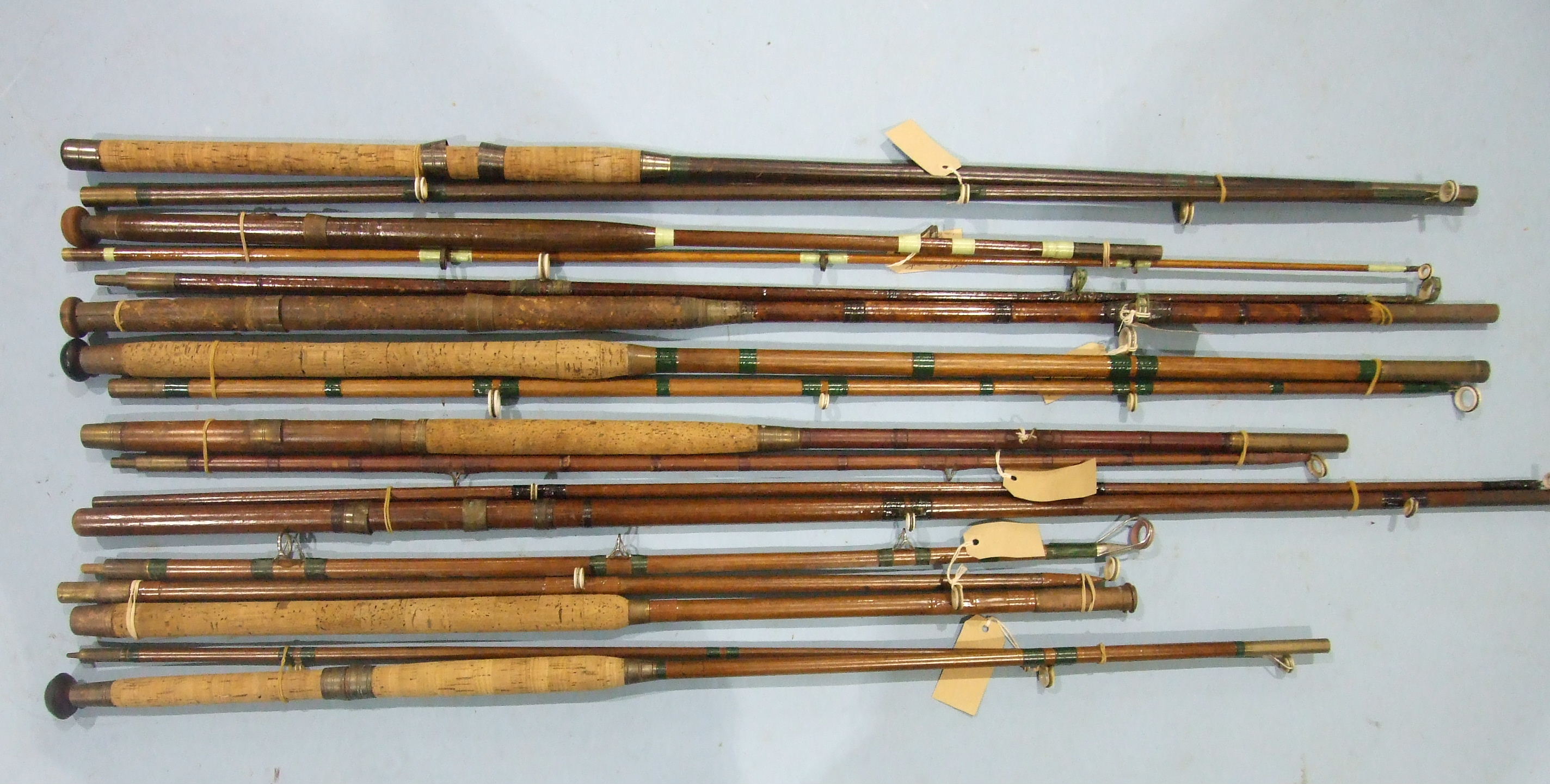 A collection of nine vintage greenheart boat rods, a whole cane beach caster rod and other rods, ( - Image 2 of 4