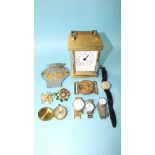 A quartz brass carriage clock, various quartz watches and other items.