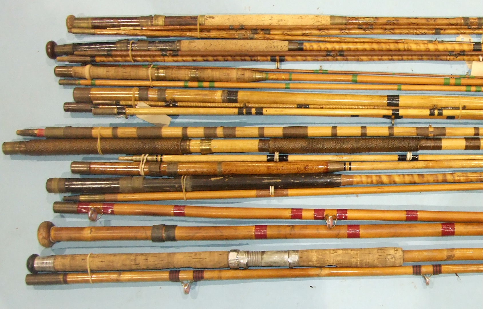 A collection of nine vintage greenheart boat rods, a whole cane beach caster rod and other rods, ( - Image 4 of 4