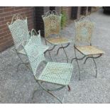 A set of four painted metal lattice work folding garden chairs, (4).