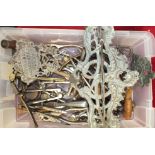 A French brass pipe rack, 17 x 26cm and a collection of metal nutcrackers, cork screws and