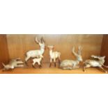 A Beswick model of a red deer, doe and faun, together with some damaged Beswick figures.