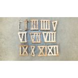 A set of metal Roman numerals, I - XII, 7cm high, (12).