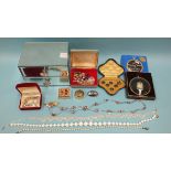 A cased set of six buttons, marked Lambourne & Co, and a small quantity of costume jewellery in a