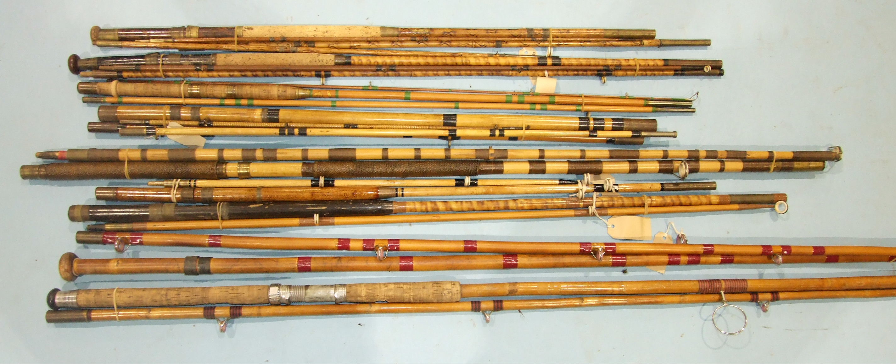 A collection of nine vintage greenheart boat rods, a whole cane beach caster rod and other rods, ( - Image 3 of 4