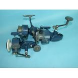 Three Mitchell No.486 fixed-spool spinning reels and other large fixed-spool reels, some damaged and