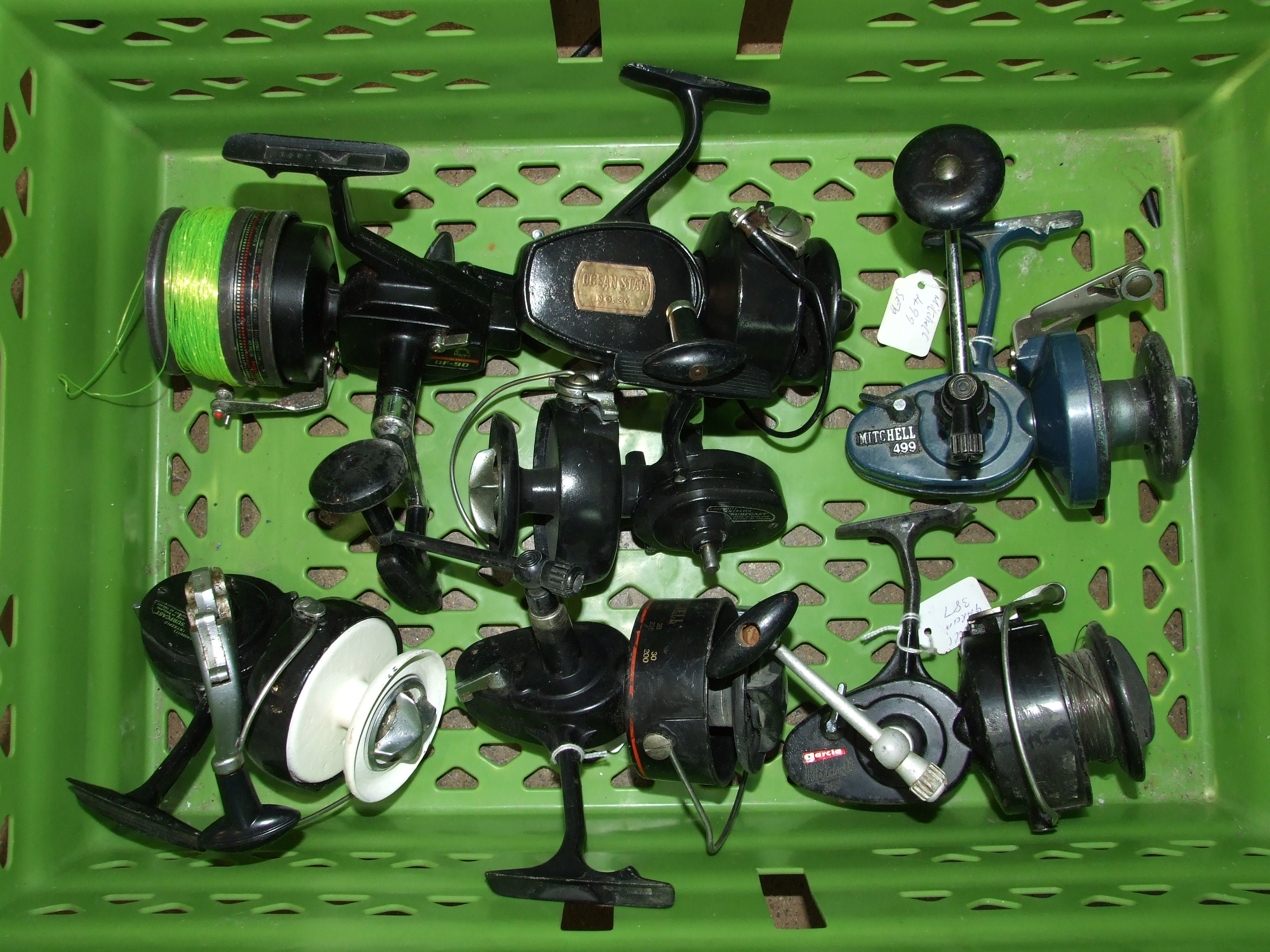 Three Mitchell No.486 fixed-spool spinning reels and other large fixed-spool reels, some damaged and - Image 2 of 2