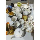 A collection of Victorian and later enamelled metal commemorative mugs, teapot and other ceramics