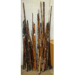 A collection of split cane, whole cane and other coarse, fly and sea fishing rods, (approximately