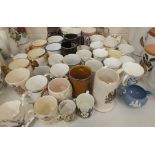 A large collection of commemorative mugs, cups, saucers and miscellanea, (approximately 150