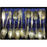 Twelve American sterling silver commemorative teaspoons.