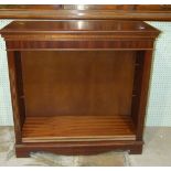 A reproduction mahogany finished low bookcase, 94cm wide, 94cm high.