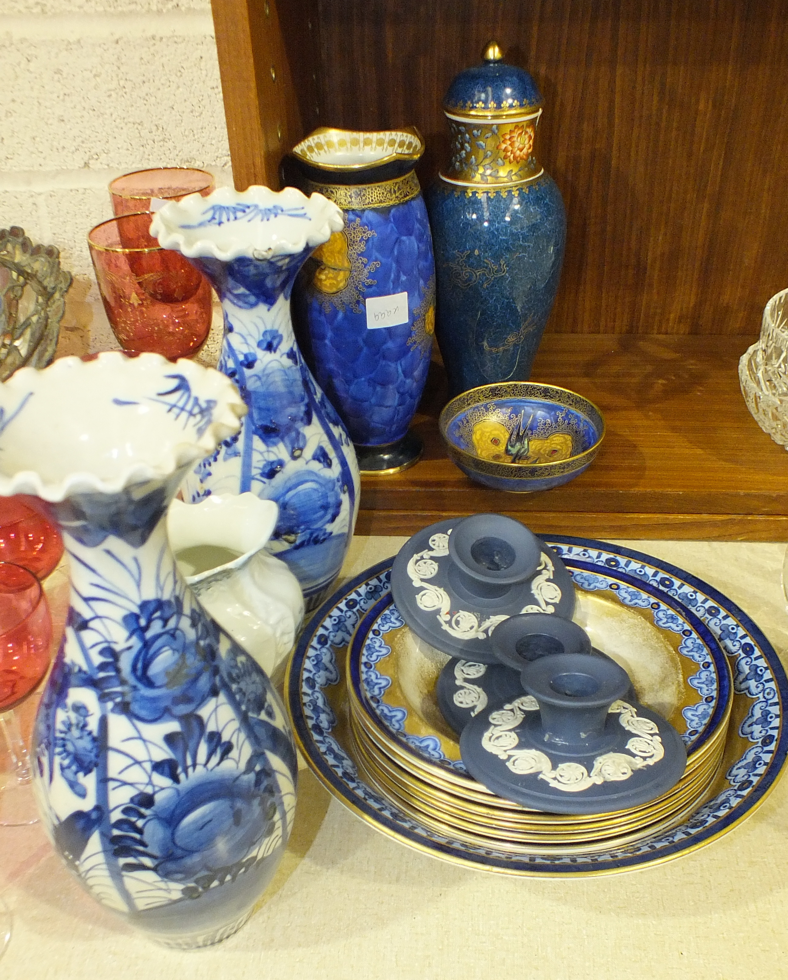 Two Chinese baluster blue and white ceramic vases, three Wedgwood jasperware candle holders and