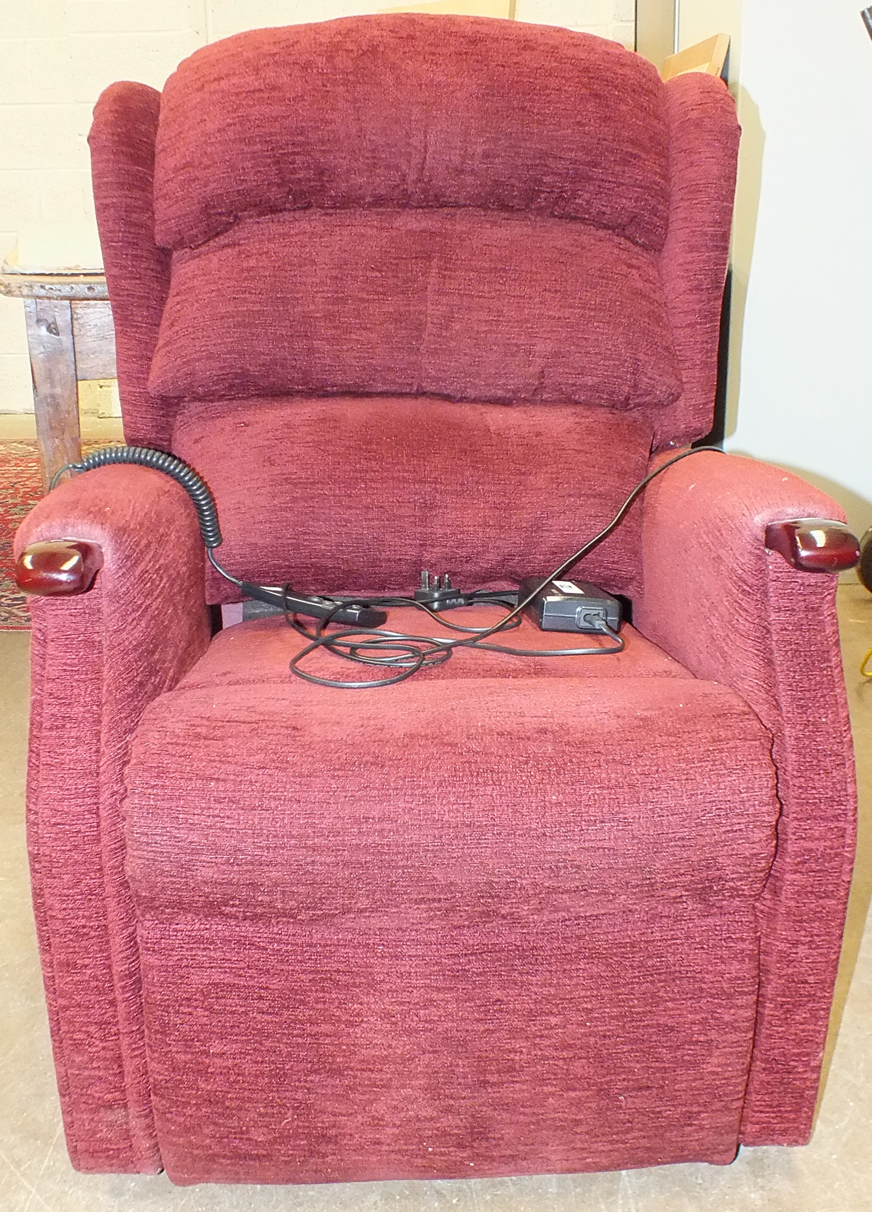 An HSL orthopaedic dual riser-recliner chair with T-motion remote control.
