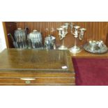 A Cardinal Plate by Elkington canteen of cutlery, cased, a three-piece silver-plated tea service and