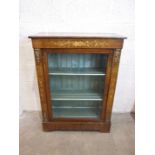 A Victorian walnut and marquetry dwarf bookcase, with single glazed door, 78cm wide, 105cm high.