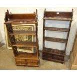 Two similar modern mahogany hanging wall shelves, 112cm high, 52cm wide and a smaller hanging wall