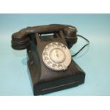 A black Bakelite telephone marked D62099, two copies of 'Blighty' magazine, Dec. 9th and 16th 1944