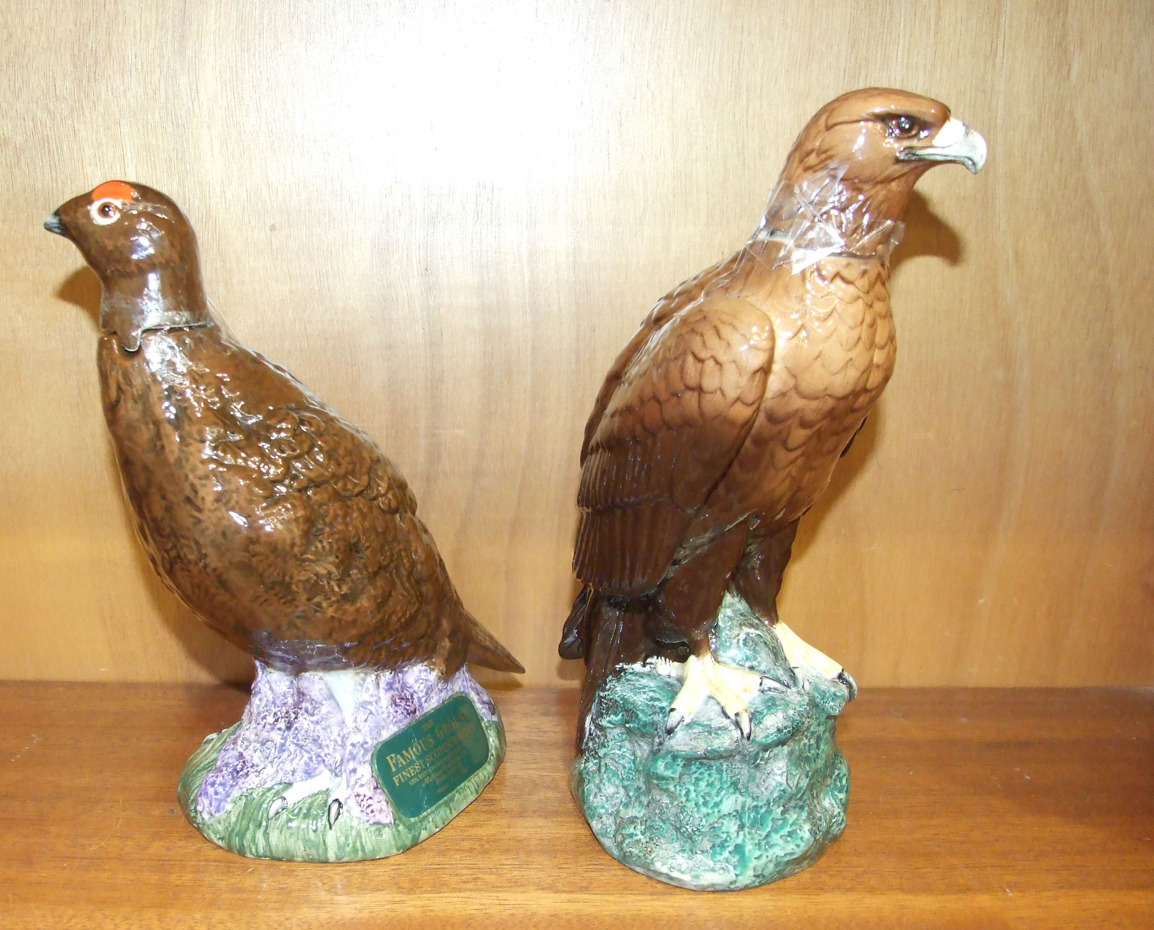 A Beswick Royal Doulton Gloag & Son 'Grouse' liqueur bottle, 25cm high and a Whyte & McKay 'Golden