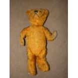 A vintage mohair teddy bear, (one eye lacking), 46cm.