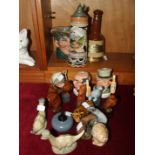 A collection of eleven Beswick Beneagles Scotch whisky ceramic bird bottles and a curling stone,