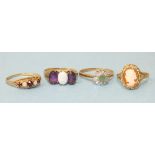 A 9ct gold garnet and opal ring, size P and three other 9ct gold rings, 7g, (4).