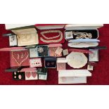A quantity of costume jewellery, in presentation boxes.