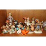 A collection of seven Goebel Hummel figures, 'Carnival' 328, 'We Congratulate' 220, 'Bird Duet' 154,