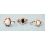 Three 9ct gold gem-set cluster rings, size P, 7g.
