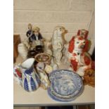 Seven liver and white and other Spaniel dogs and other ceramics.