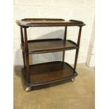 An Ercol three-tier trolley.