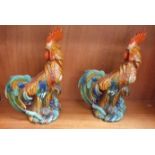 Two painted ceramic cockerel figures, 33cm high, (2).