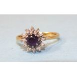 An amethyst and diamond cluster ring set a round-cut amethyst and twelve 8/8-cut diamond points,