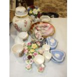 A modern Wedgwood blue and white jasperware heart-shaped box and cover, two similar small dishes,