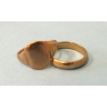 A 9ct gold wedding band and a 9ct gold signet ring, both size Q, 6.5g.