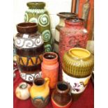 A collection of six W Germany decorated ceramic vases, tallest 48cm, a Scheurich jug, 16.5cm high