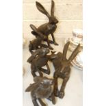 After Joanna Martins, a collection of five cold-cast bronzed resin models of hares, including '