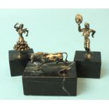 Three small Spanish white metal figures on black marble stands: bull, matador and flamenco dancer, 5