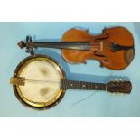 A full-sized copy "Jean Baptiste Vuillaume" violin, with two-piece 14'' back and a damaged banjo/