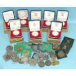 A collection of eight Royal Mint "The Queens Silver Jubilee silver proof coins, boxed, various