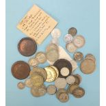 A collection of British and world coinage, including a small quantity of pre-1947 silver.