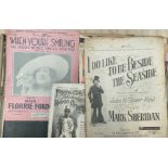 A quantity of sheet music, including 'I do like to be beside the seaside' and 'When you're