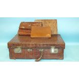 A crocodile skin suitcase, 61cm wide, 41cm deep, handle damaged, a crocodile skin handbag and