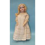 A Cuno & Otto Dressel bisque head doll with sleeping blue eyes and blonde mohair wig on jointed wood